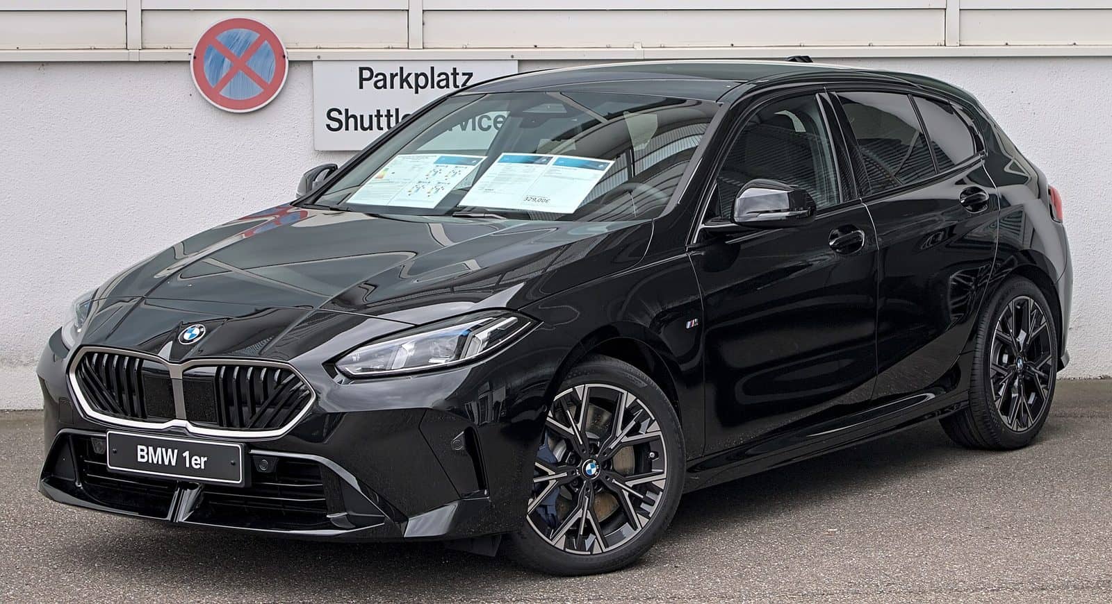 Black BMW 120, front three-quarter view