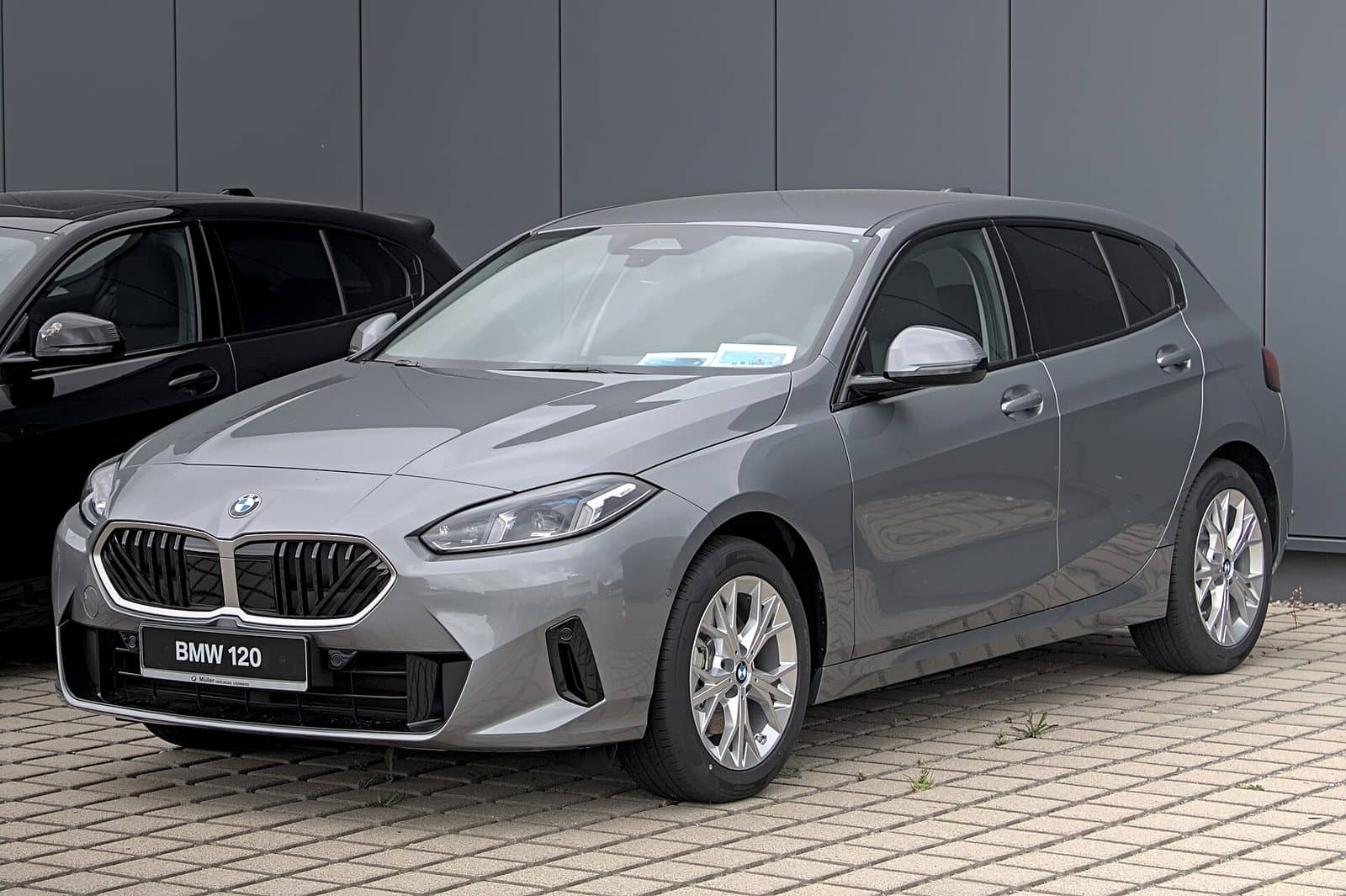 Grey BMW 120, front three-quarter view