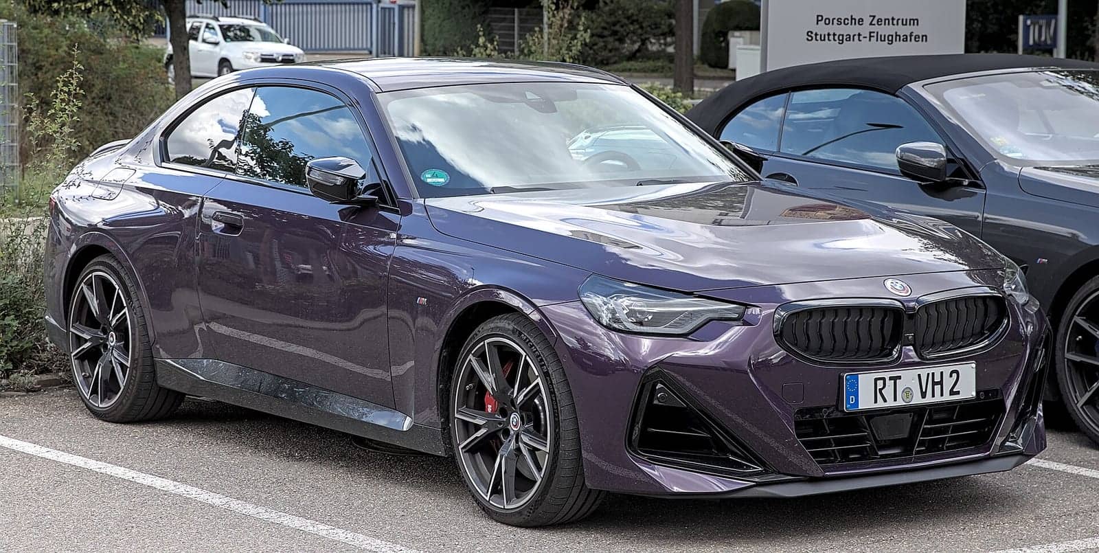 Purple BMW M240i coupé, front three-quarter view