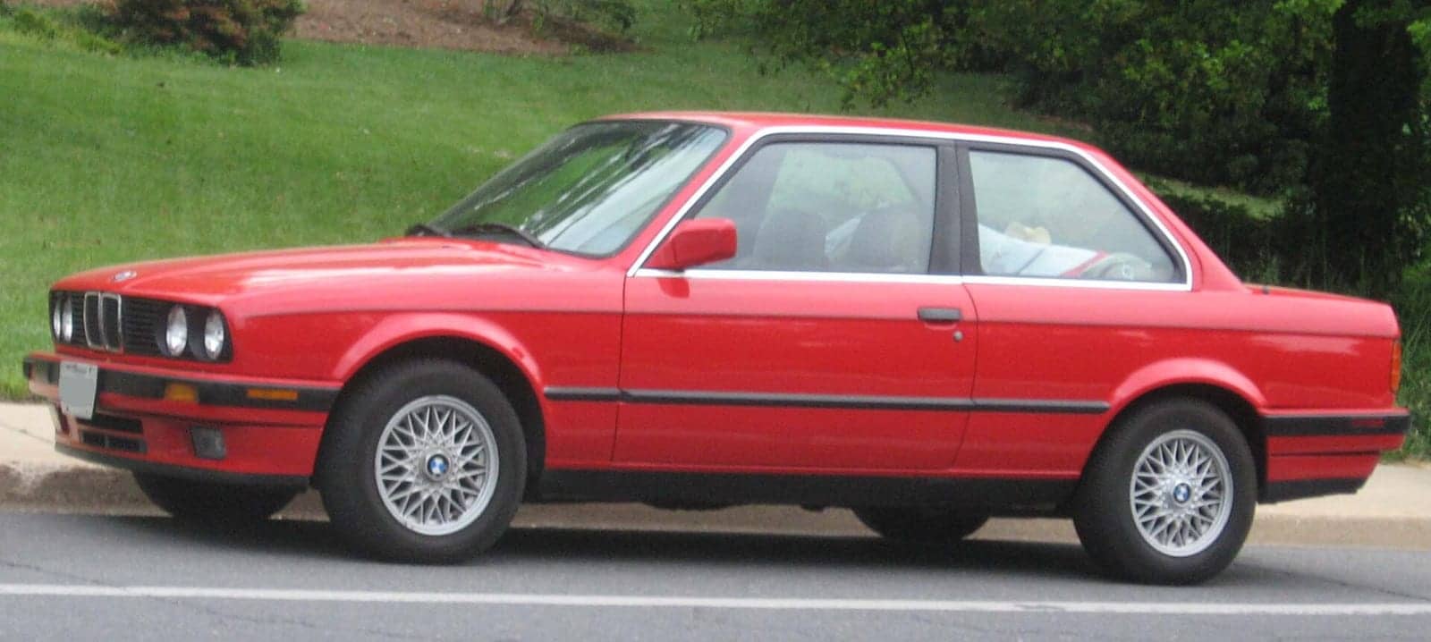 Red BMW 3 Series two-door (facelift), side view