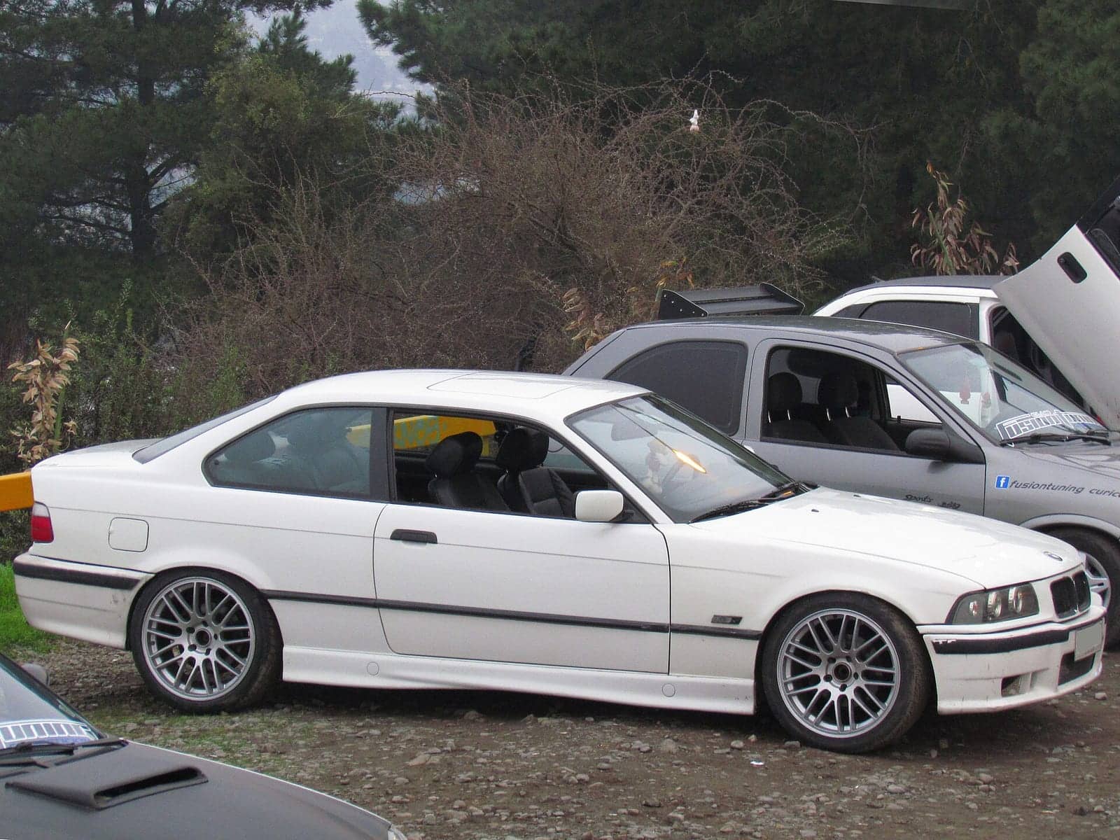 White BMW 328i coupé, side view
