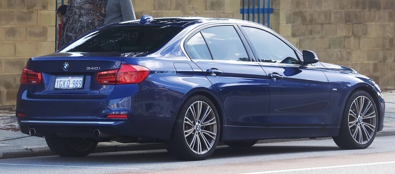 Blue BMW 340i Luxury Line sedan, rear view