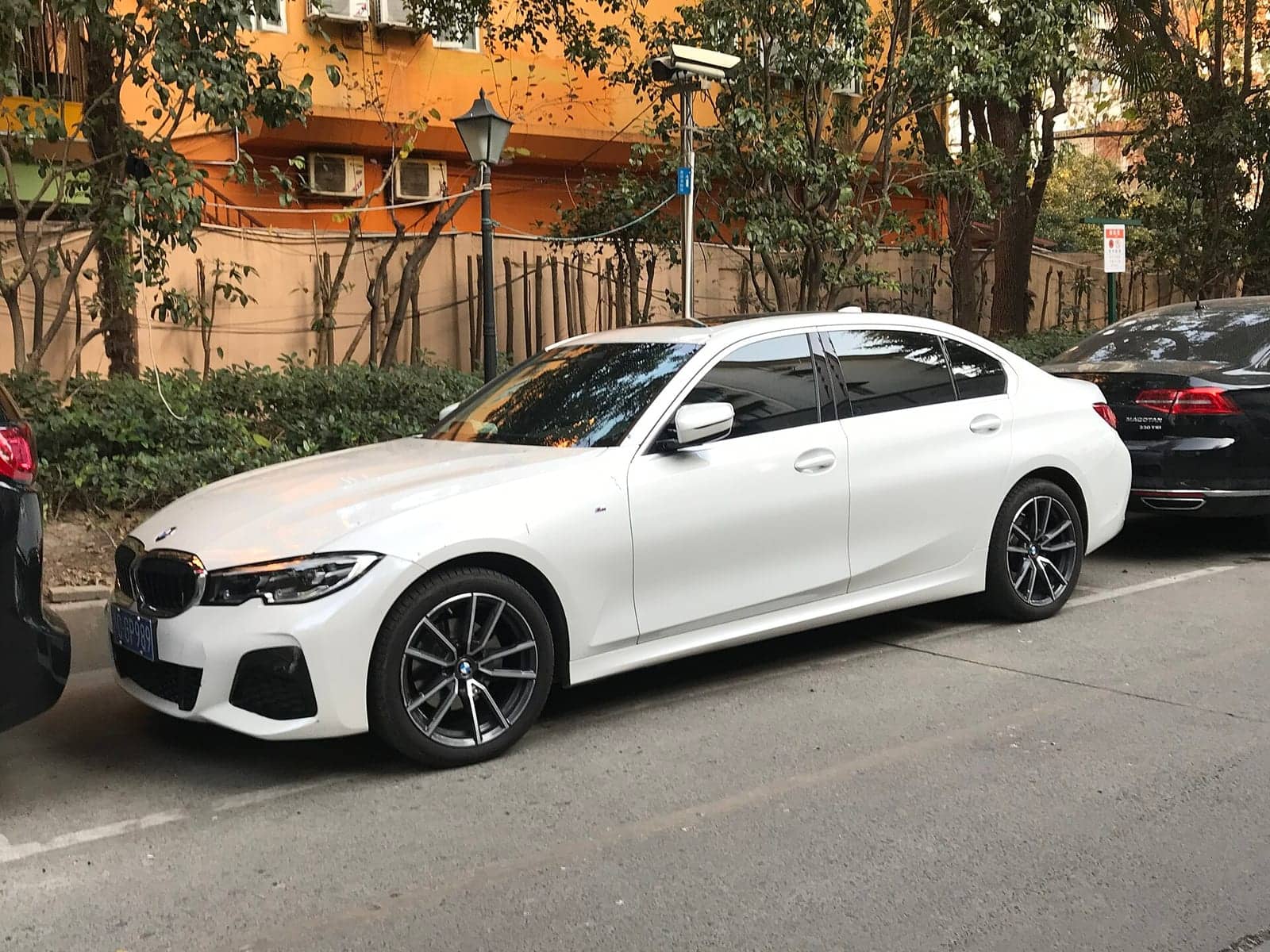 White BMW 325Li, front three-quarter view
