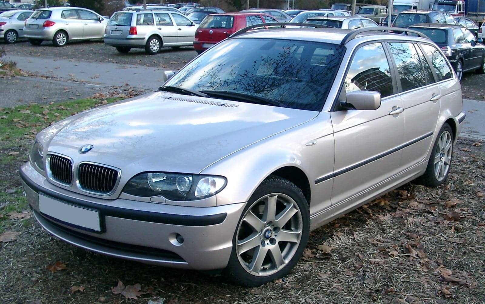 Silver BMW 3 Series Touring (facelift), front three-quarter view
