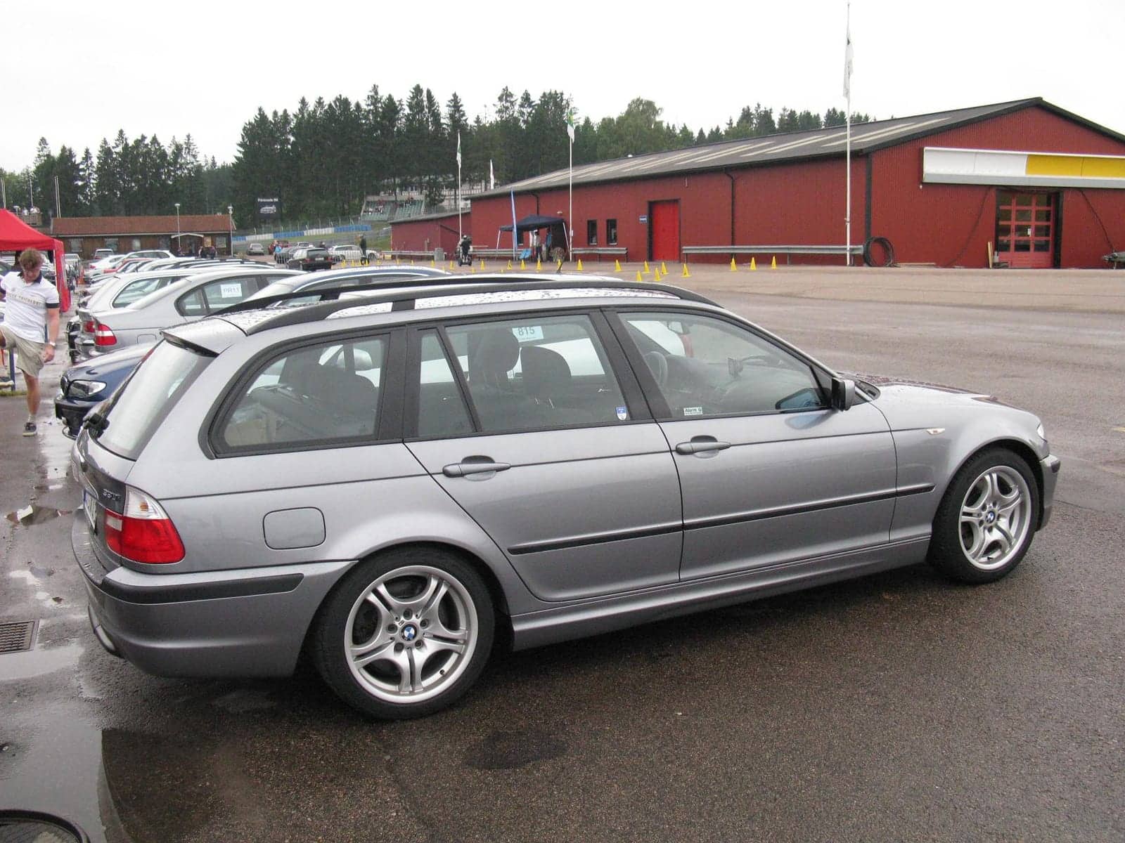 Silver BMW 330i Touring M Sport, side view