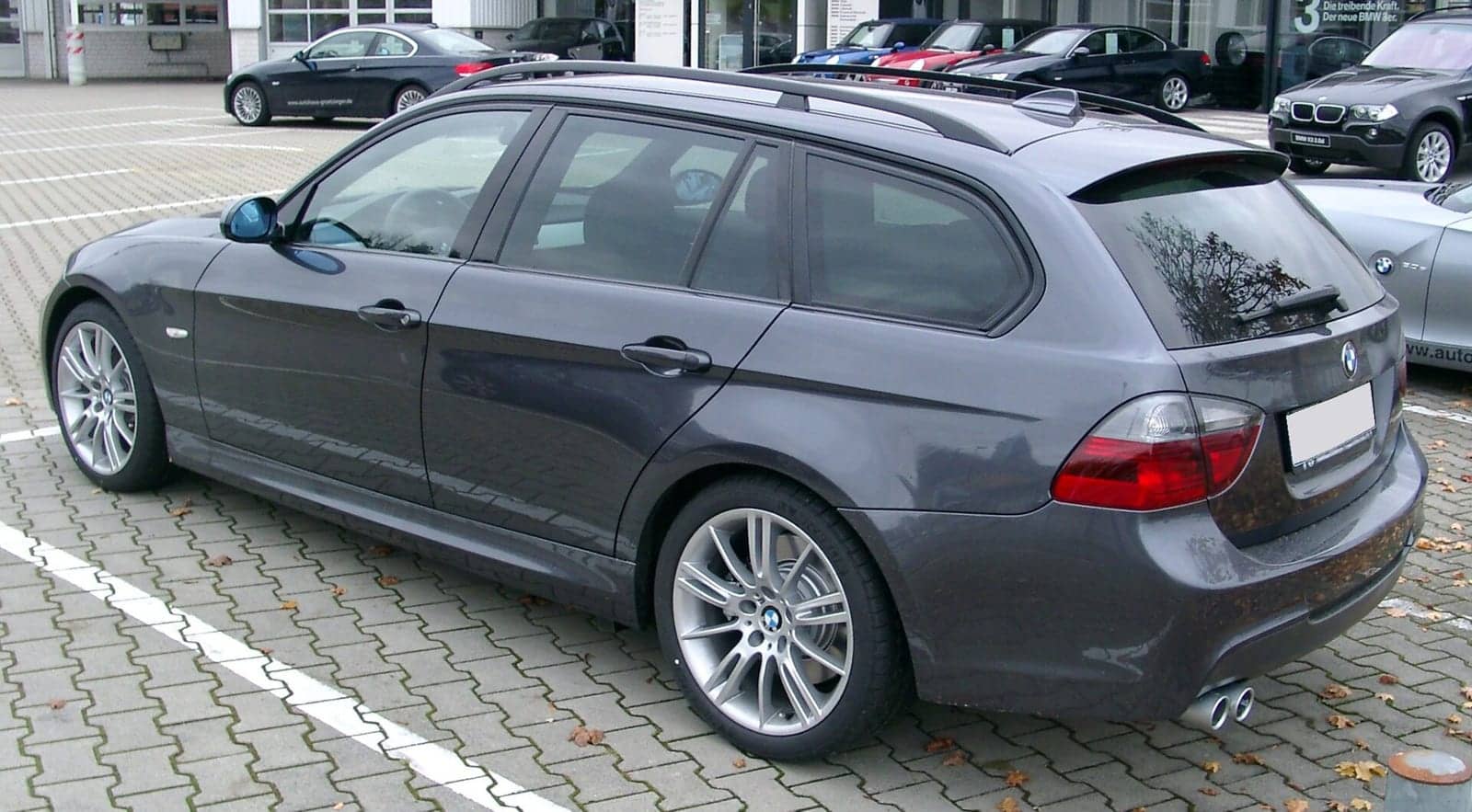 Grey BMW 3 Series Touring, rear three-quarter view