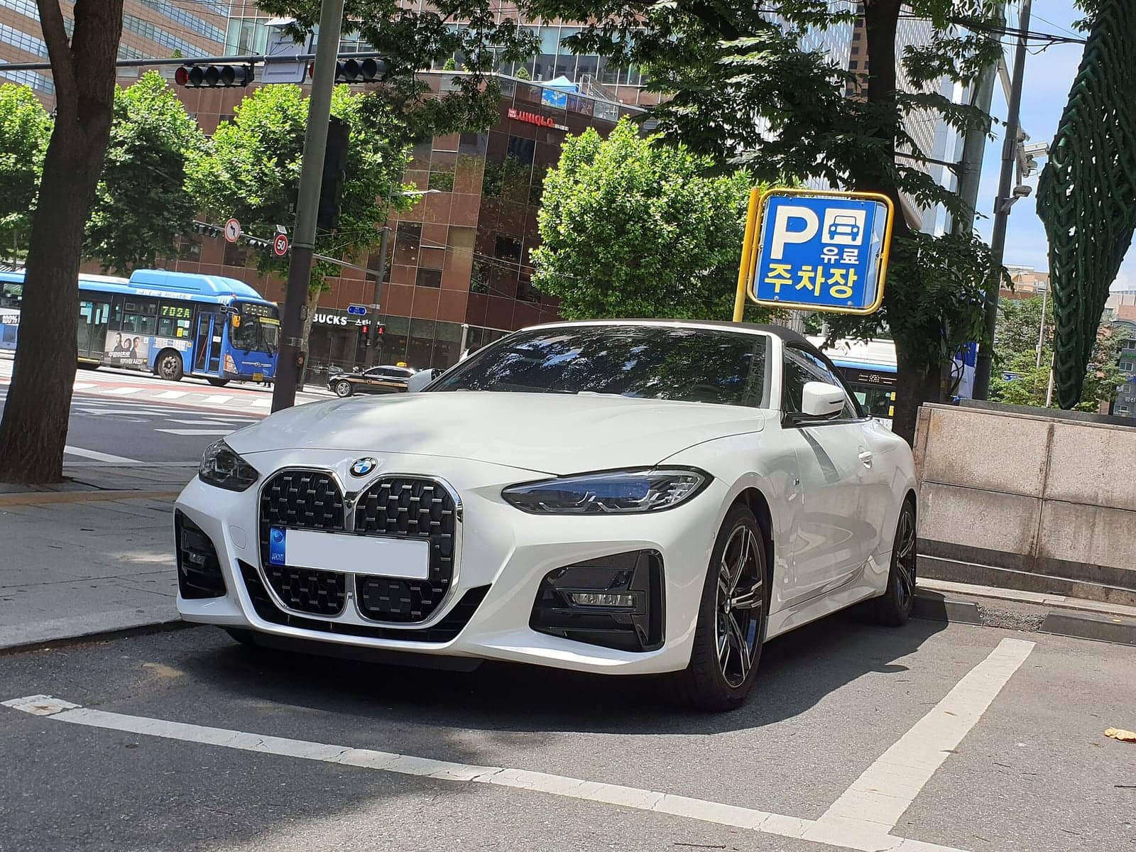 White BMW 420i convertible, front three-quarter view