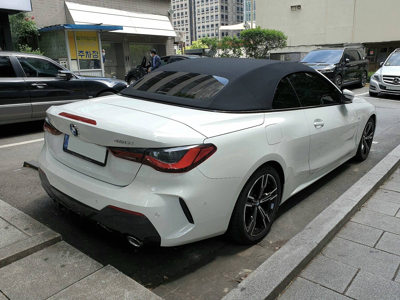 White BMW 420i convertible, rear three-quarter view