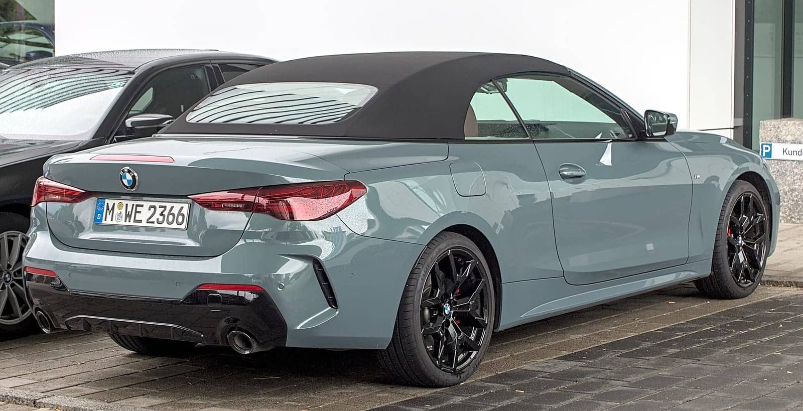 Grey BMW 4 Series convertible (facelift), rear three-quarter view