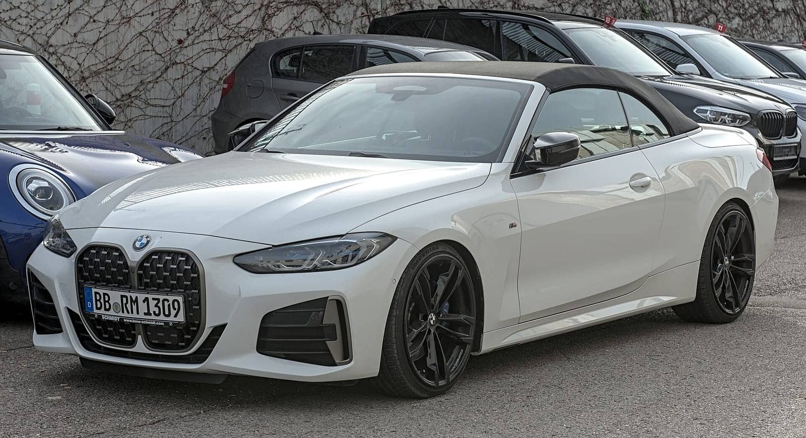 White BMW M440i convertible (facelift), front three-quarter view