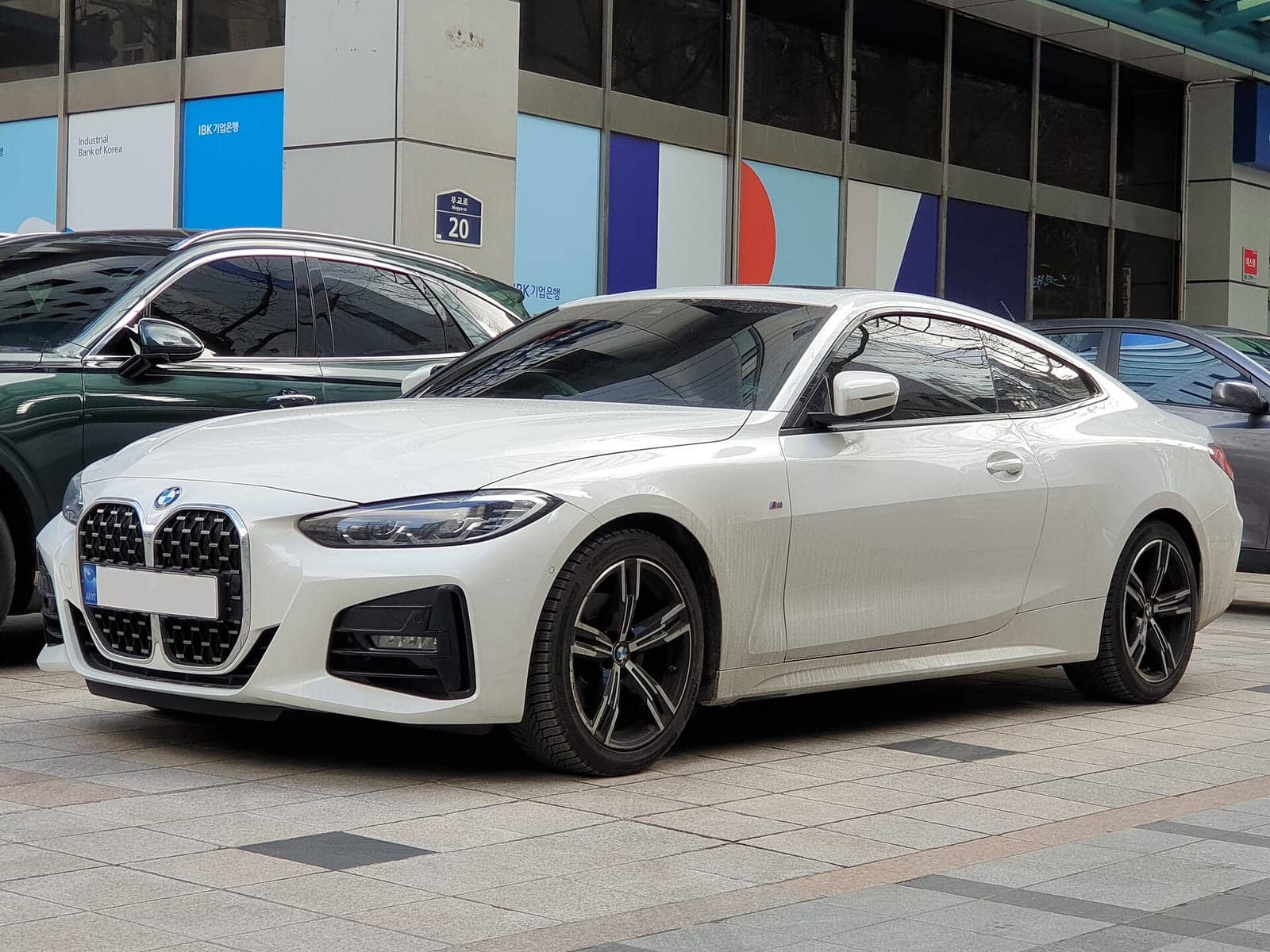 White BMW 430i M Sport coupé, front three-quarter view