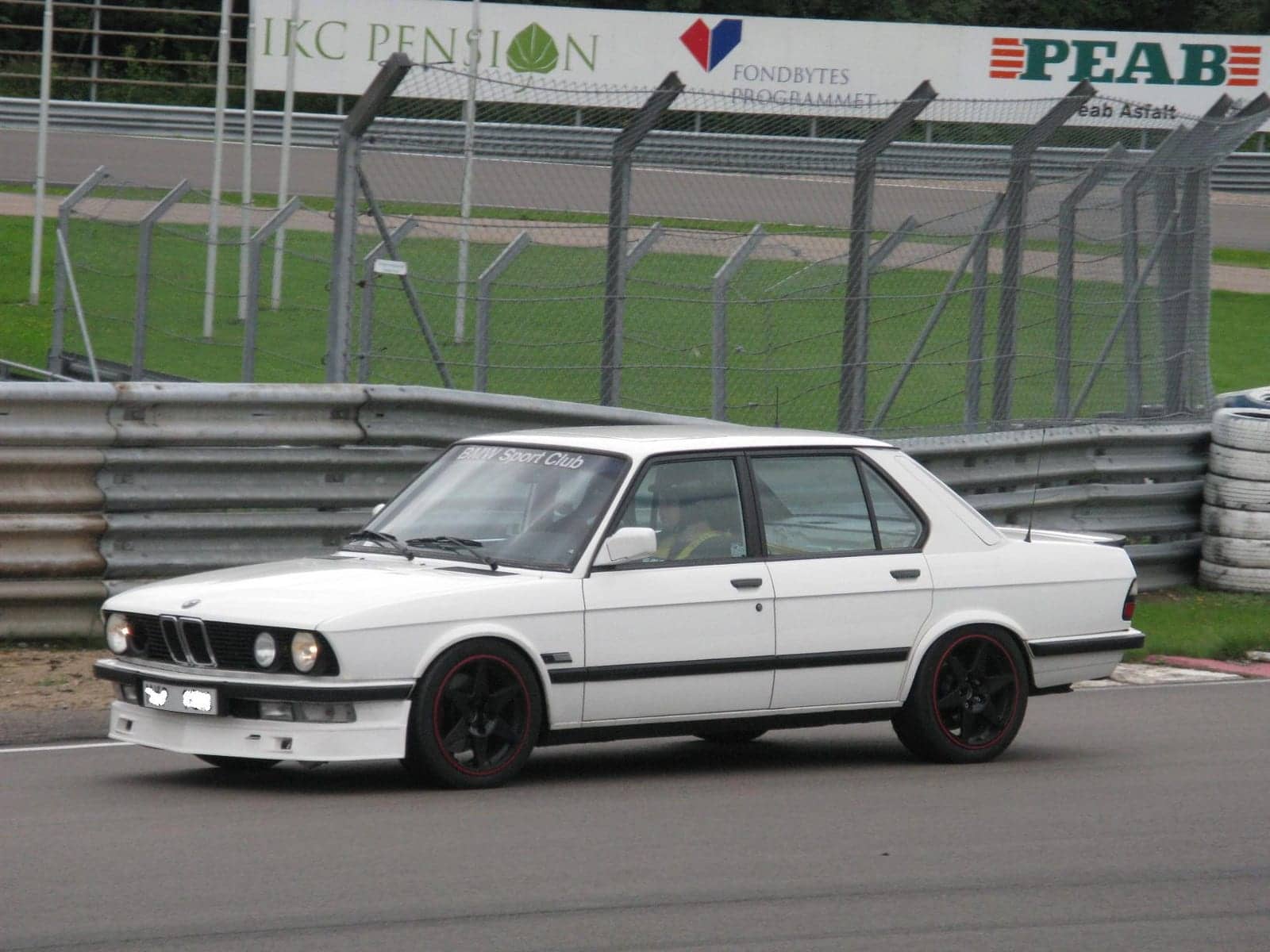 White BMW 535i, front three-quarter view