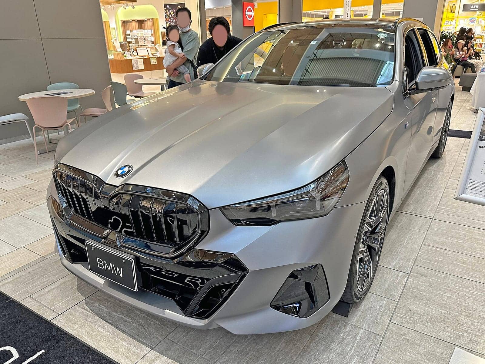 Grey BMW 523d xDrive Touring M Sport, front view