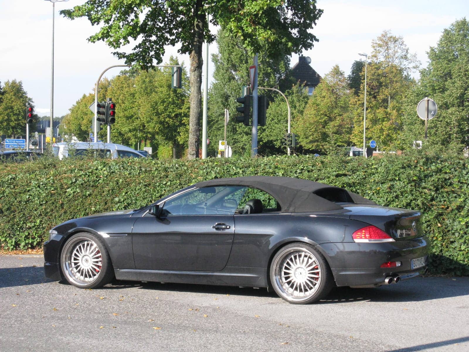 Black BMW 6 Series convertible, side view