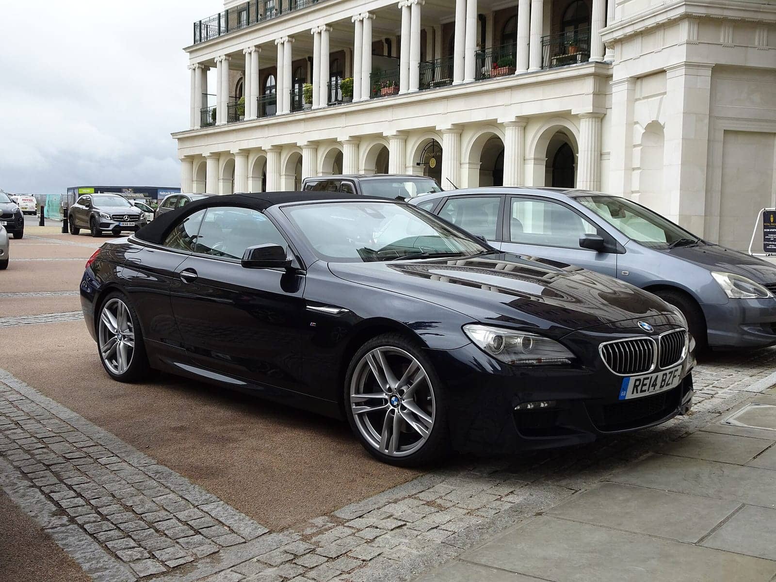 Black BMW 640d convertible (facelift), front three-quarter view
