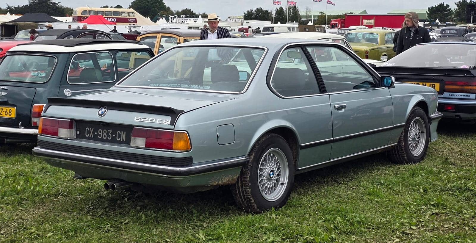 Pale blue BMW 628CSi, rear three-quarter view