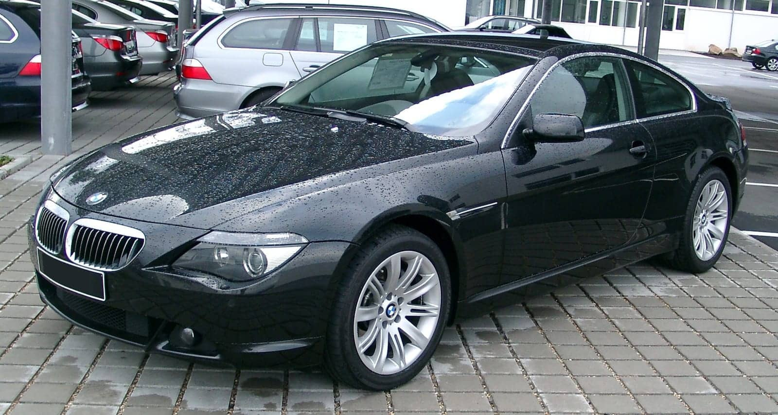 Black BMW 6 Series coupé, front three-quarter view