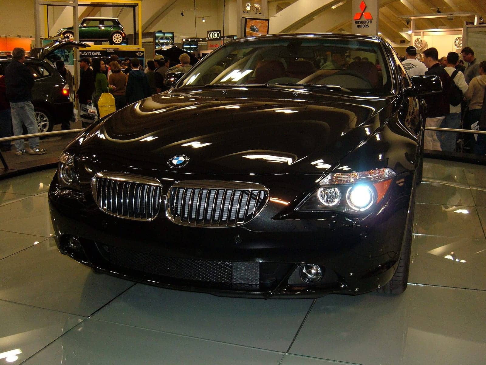 Black BMW 645Ci coupé in a showroom, front view