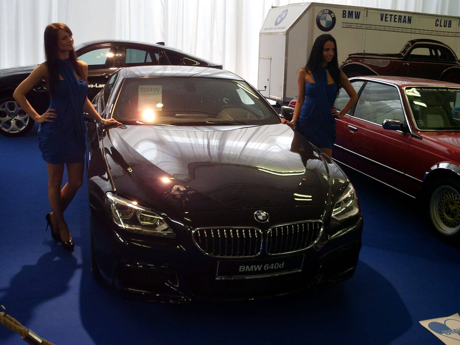 Black BMW 640d coupé at a motor show, front view
