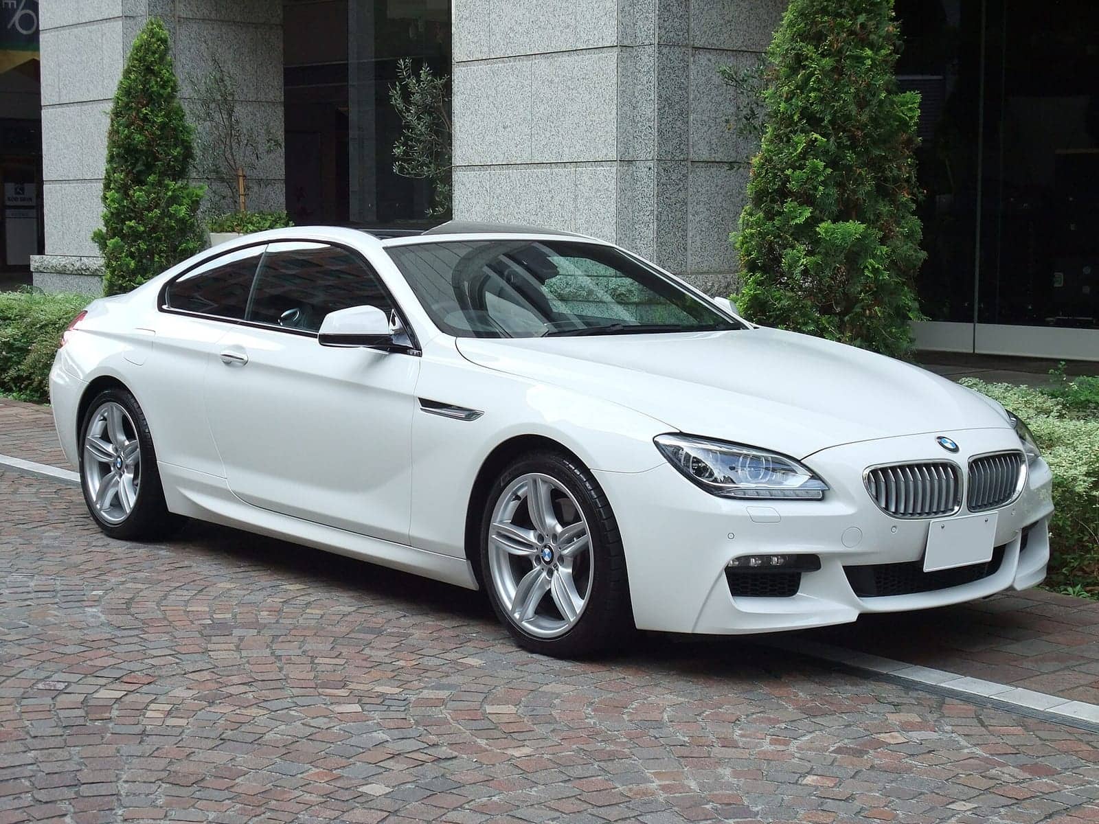 White BMW 650i M Sport coupé, front three-quarter view