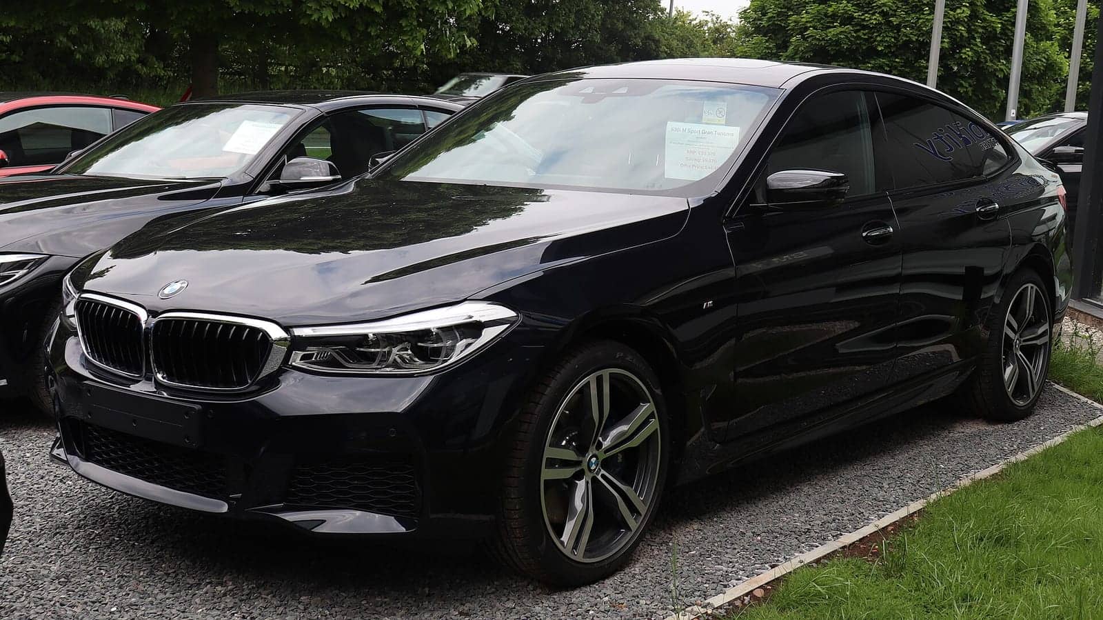 Black BMW 630i Gran Turismo M Sport, front three-quarter view