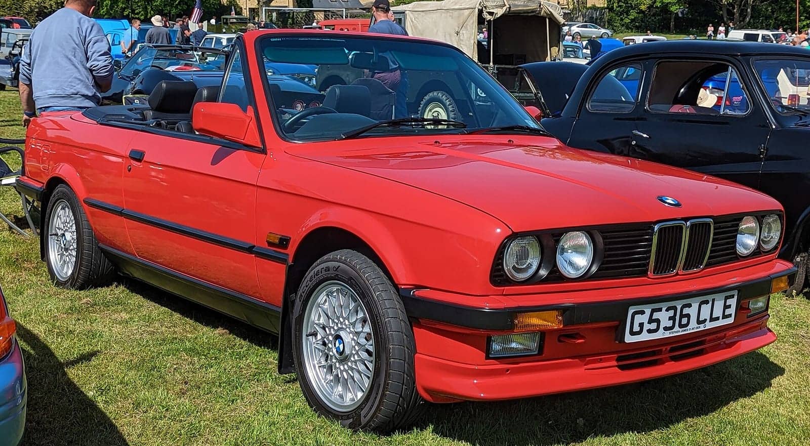 Red BMW 325i convertible, front three-quarter view