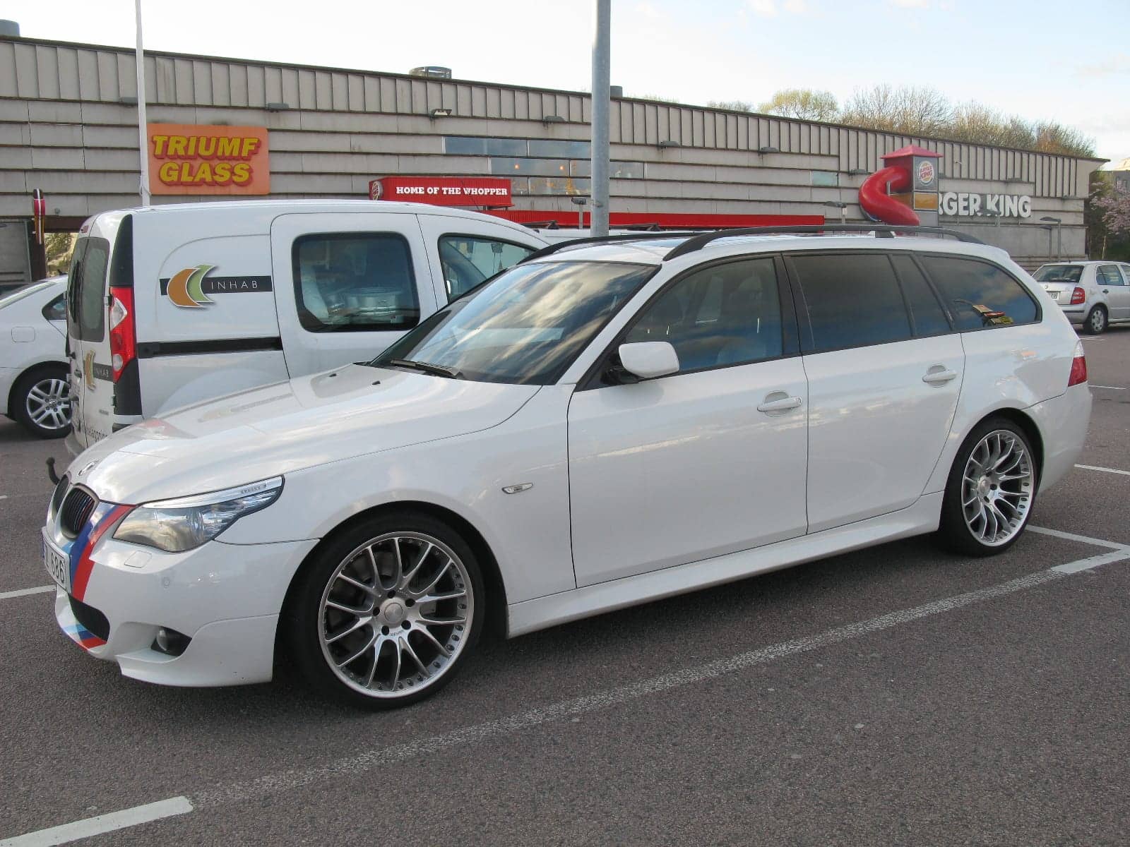 White BMW 535d Touring M Sport, front three-quarter view