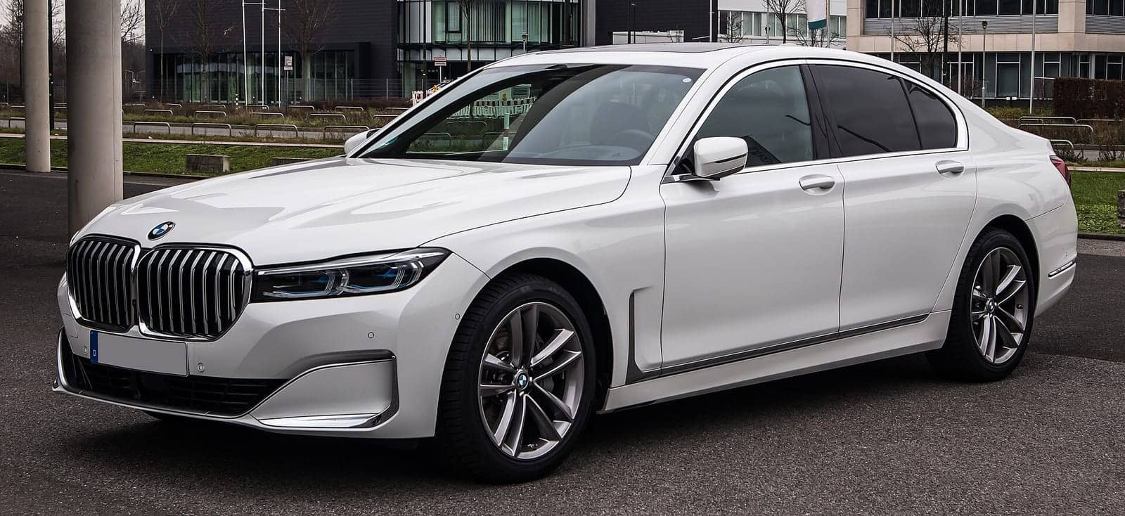 White BMW 730d, front three-quarter view